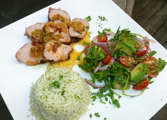 Grilled pork tenderloin with chipotle orange glaze, Mexican rice with cilantro dressing and avocado and tomato salad with toasted cumin seed dressing make for one big Fiesta!
