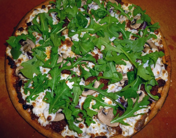 If you like, you can add a sprinkle of fresh arugula leaves to the finished pizza for a little peppery bite!